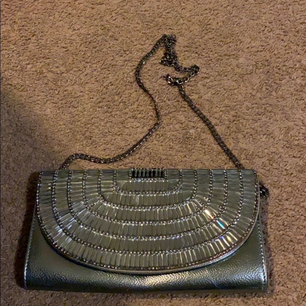 Silver crossbody purse.